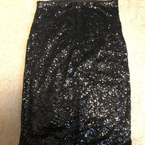 Like new black midi Express sequin skirt.